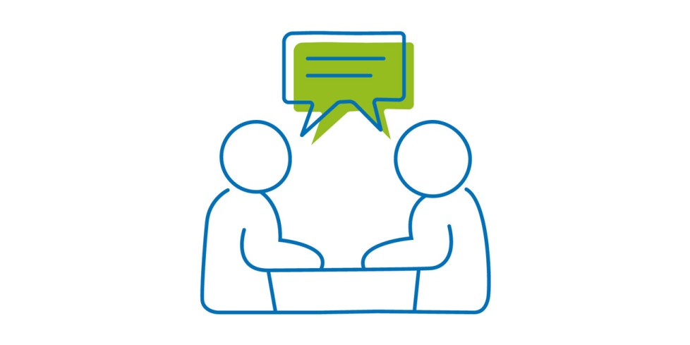 Das Icon zeigt zwei Personen an einem Tisch, über Ihnen schwebt eine gemeinsame Sprechblase.